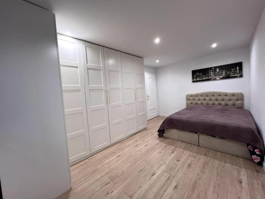 Daire Logement-proche Strasbourg-rez De Jardin-centre *
